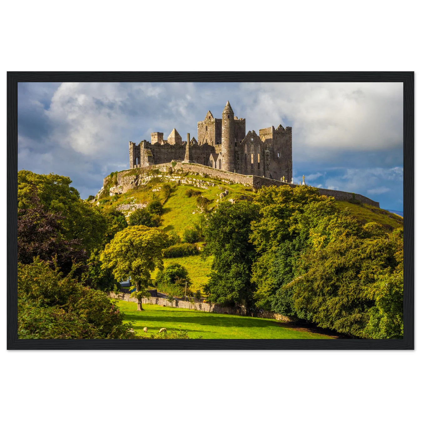 Framed wall art print of the Rock of Cashel on a hill under a cloudy sky in County Tipperary, Ireland