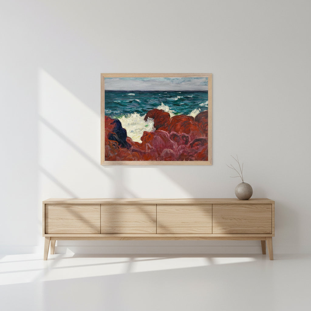Framed Red Rocks and Sea Irish art print displayed above a light oak sideboard, Scandinavian minimalis.
