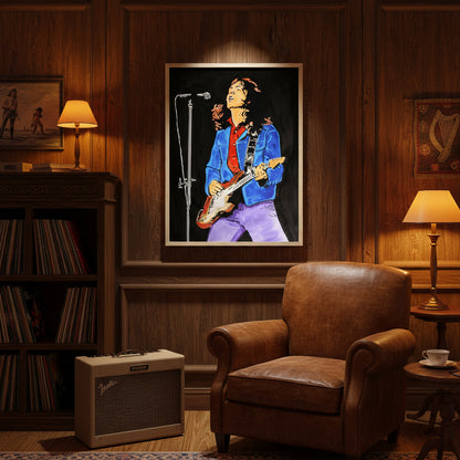 Rory Gallagher framed artwork above leather armchair in classic study with bookshelves and vintage decor