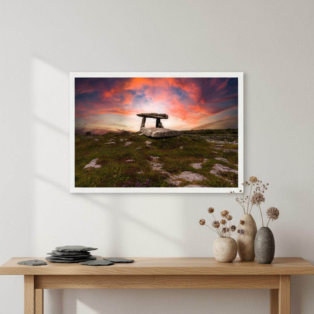 Poulnabrone Dolmen framed artwork displayed above a console table with stone vases, dried wildflowers and slate tiles, invoking a refined Irish heritage atmosphere.